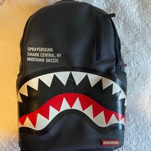 Sprayground Black Backpack with Red & White Shark Mouth Graphic